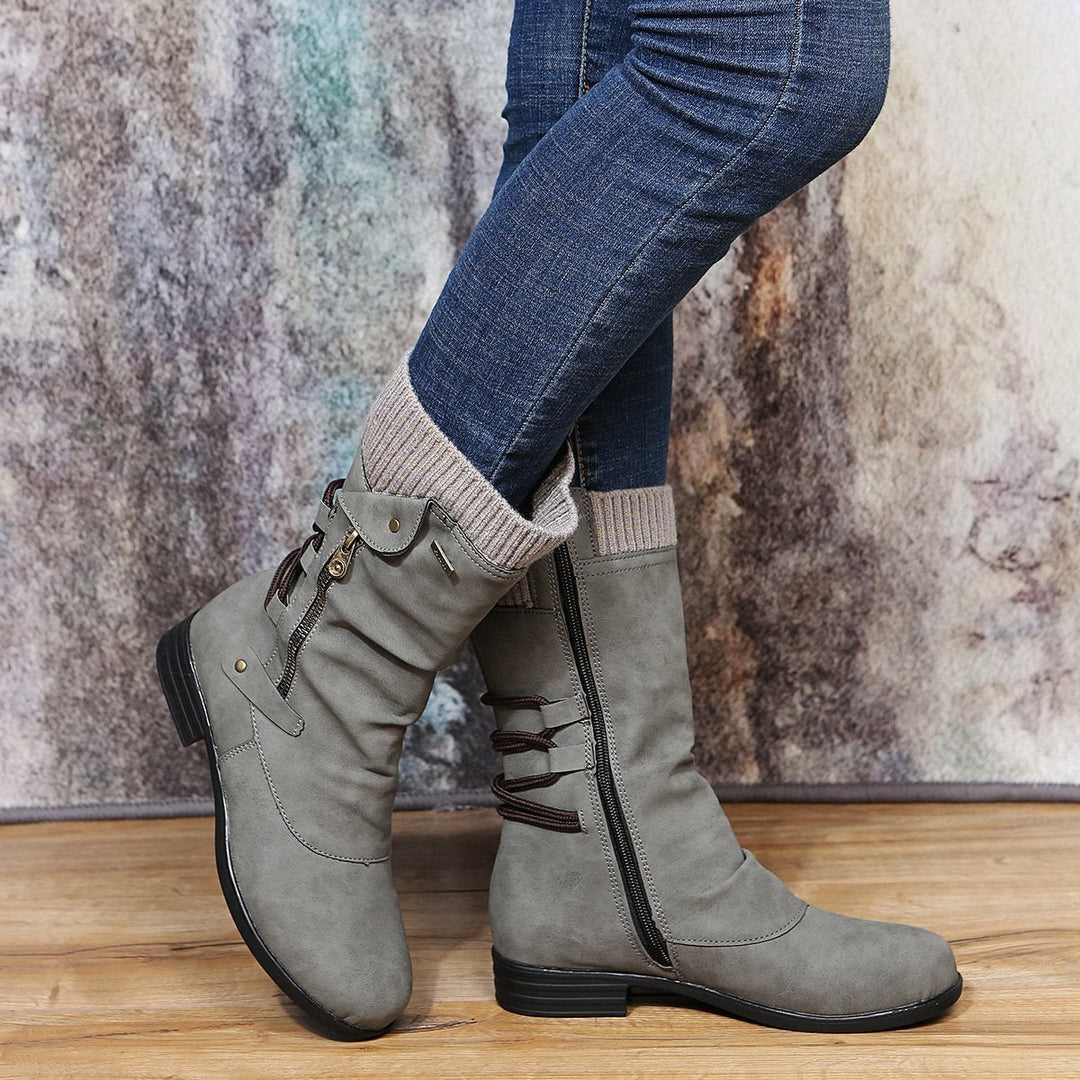 Women’s fashion boots with side zipper and flat heel