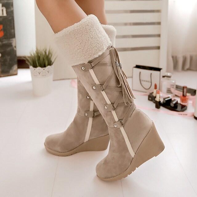 Stylish women's high snow boots with lace-up design